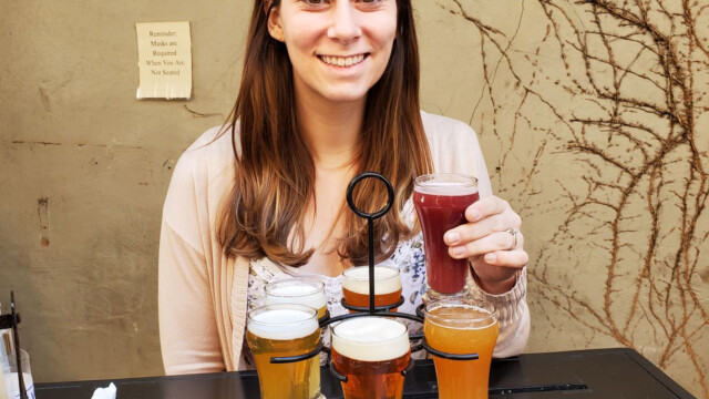 A delicious lunch flight at Druthers. Melissa and flight