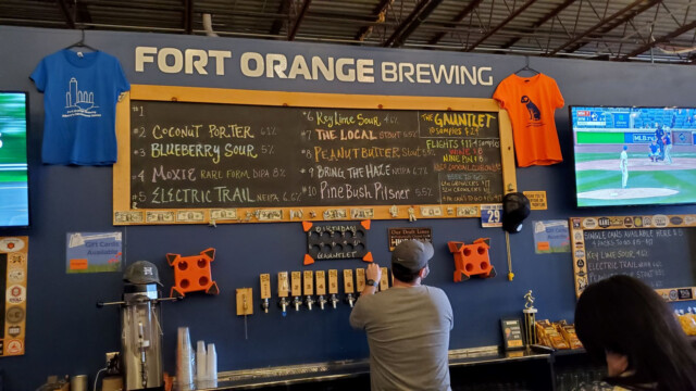 Look at all these delicious beers! Tap Wall at Fort Orange
