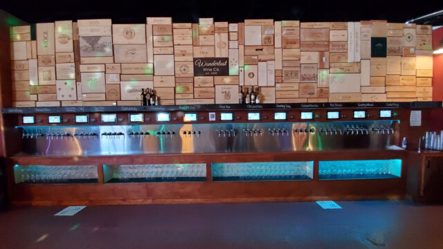 The Wanderlust wall of wine created by Pour My Beer Wanderlust
