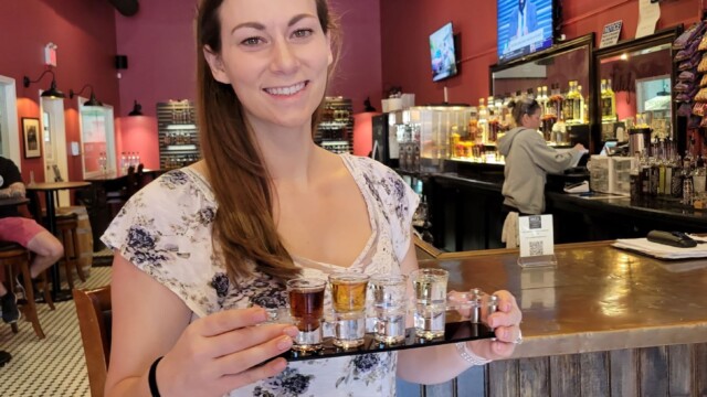 Melissa + her flight of spirits. NOLA Distillery